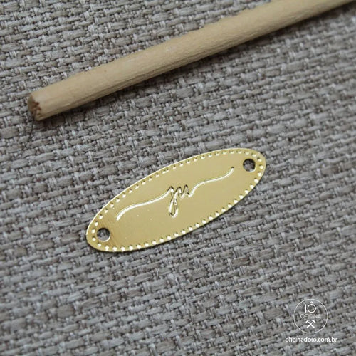 etiqueta de metal oval personalizada