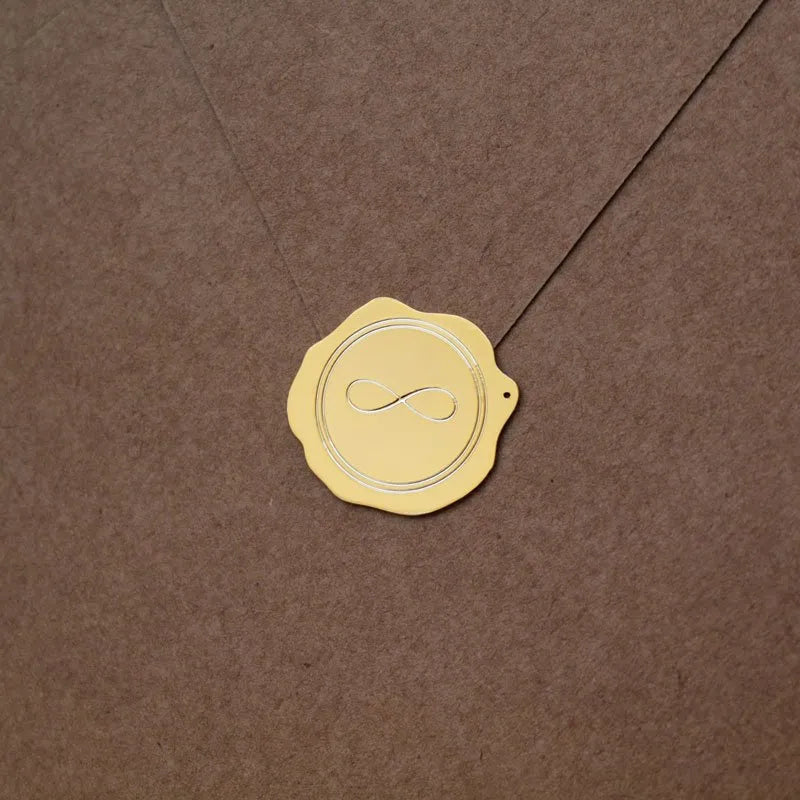 lacre de metal para convites símbolo infinito dourado